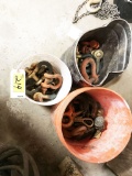 3 buckets of assorted hooks and shackles