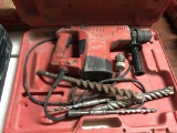 Milwaukee hammer drill in case with asst bits