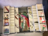tackle box of weights, bobbers, lures, jigs, etc
