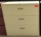 metal 3-drawer lateral file cabinet; beige; measures 42