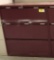 metal 3-drawer lateral file cabinet; red; measures 36