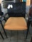 reception chair; orange/black fabric
