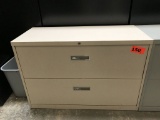 metal 2-drawer lateral file cabinet; beige; measures 42