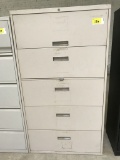 metal 5-drawer lateral file cabinet; with pull-out shelf; tan; measures 36