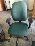 rolling office chair; green fabric