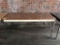 metal table with laminate top, is 60