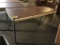metal table with laminate top, is 60