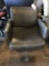 rolling arm chair, black leather