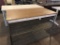 metal top table with laminate top, is 60