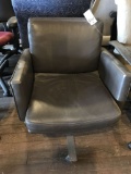 rolling arm chair, black leather