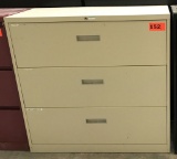 metal 3-drawer lateral file cabinet, beige, measures 42