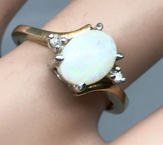Opal and Diamond ring; 2.7g 10ky yellow gold; size 6.25