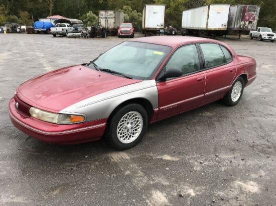 1996 Chrysler LHS 4-door red sedan; 137134mi; 3.5L V6 gas engine; automatic; air conditioning; power