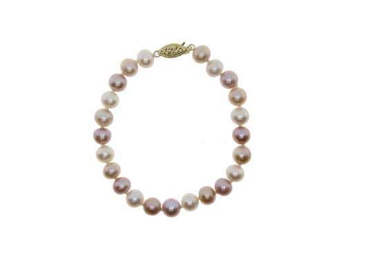 Fresh Water Pearl 7'' bracelet in 14kt Yellow Gold, 7-7.5mm pink pearls. Retail price $200. Due to i