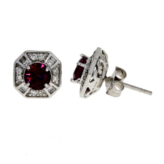 1.20ct Garnet and 0.26ct Diamond stud earrings in 14kt White Gold. Diamonds are H-I color, round, VS