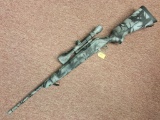 Remington 710 30-06 rifle, s#71021239, bolt action, gray/black camo, magazine fed, Simmons 3-9x50 sc