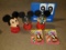 Three Mickey Mouse gumball dispensers and two Mickey Gumball pocket packs