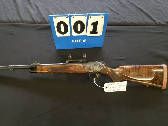 Moore Auctions Gun and Sportsman's Auction