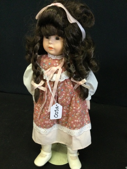 Vintage porcelain head cloth doll