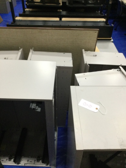 Two dissembled file cabinets