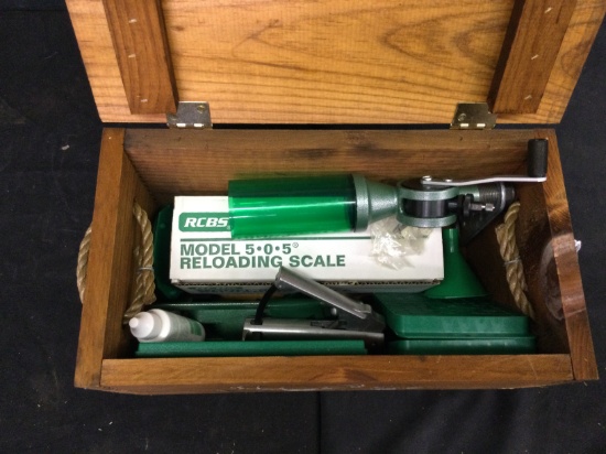 Wooden box with assorted RCBS reloading tools