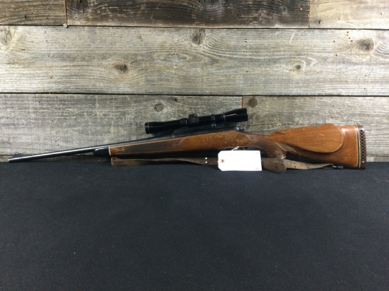 Remington 700 with Leupold M8 4x scope 280 Rem