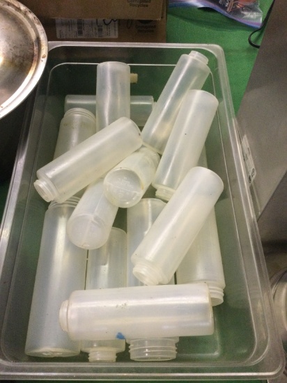 Bin of Sauce Bottles