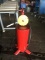 Fluid holding tank with hand pump