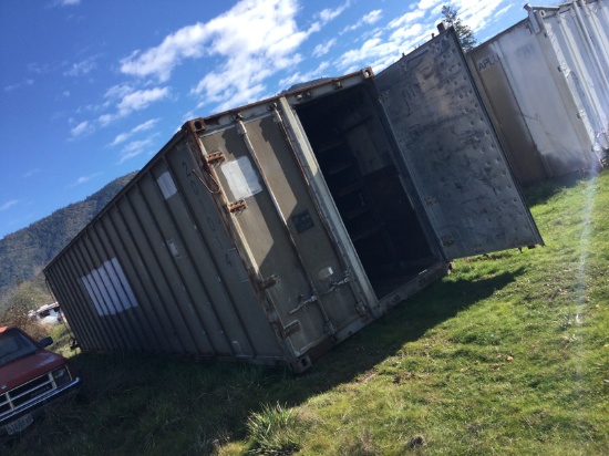 40ft shipping container. Has power and shelving
