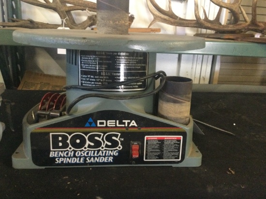 Delta B.O.S.S Bench Oscillating Spindle Sander With tote of extra abrasives