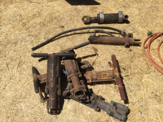 Pile of old jack hammers
