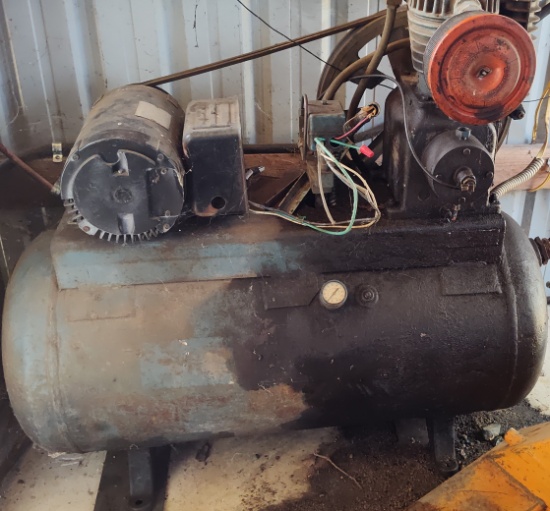 Old air compressor, has oil leak from motor