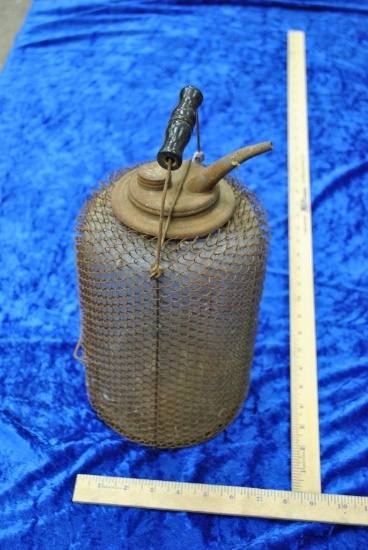 Oil bottle with wire protector.