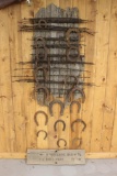 Barbwire, Horseshoes, and Wooden Sign