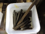 Bucket of assorted air punches and chisels