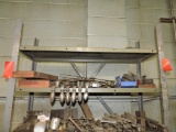 Row of handles for milling machine (shelf between red tape)