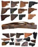 24 ASSORTED HOLSTERS; MOSTLY MILITARY.