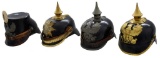 4 WWI GERMAN HELMETS.