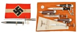 4 WWII GERMAN STYLE MINIATURE DAGGERS & 1 ARMBAND.