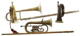 4 EUROPEAN BRASS MUSICAL INSTRUMENTS & A CANE.