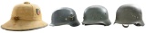 4 WWII GERMAN HELMETS.