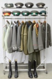 LARGE GROUP OF EAST GERMAN UNIFORMS, HATS &