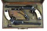 CASED PAIR GALAND SINGLE SHOT TARGET PISTOLS.