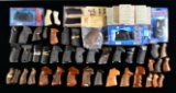 GROUPING OF HAND GUN GRIPS.