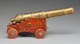 DECORATIVE BRASS NAVAL CANNON ON CARRIAGE.