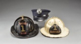 2 FIRE HELMETS, BADGES, HANDCUFFS & RELATED ITEMS.