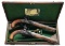 CASED PAIR OF DUELING PISTOLS BY JOHN HARCOURT OF