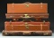 5 HIGH QUALITY FITTED LEATHER COVERED GUN CASES.