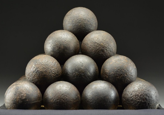 PYRAMID OF 30 12-POUND CONFEDERATE CANNON BALLS.