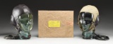 2 WWII GERMAN FLIGHT HELMETS & ISSUE ENVELOPE.